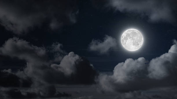 istock a movement of the moon across the starry sky with clouds 2153432154