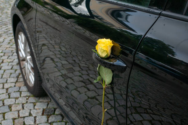 car decorated with a blue lace flower at a wedding
