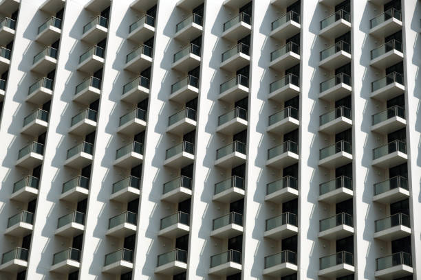 gray multi-story building with many balconies