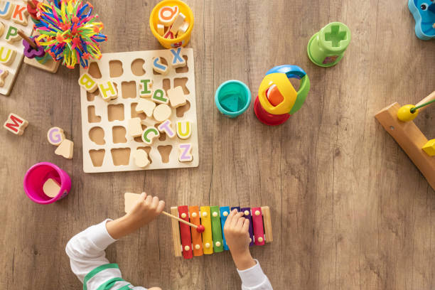 istock Nurse and Boy Play Metallophone 2153446413