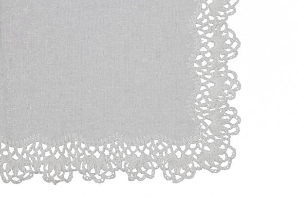 istock white cotton handkerchief with handmade lace, isolated 2153451752