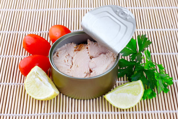 istock open canned tuna can on bamboo mat top view 2153459133