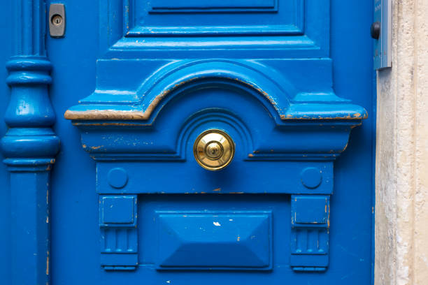 istock Paris, France: Ornate Old Blue Door With Gold Knob 2153463668