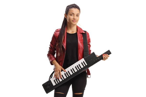 istock Female musician playing a keytar and standing 2153464262