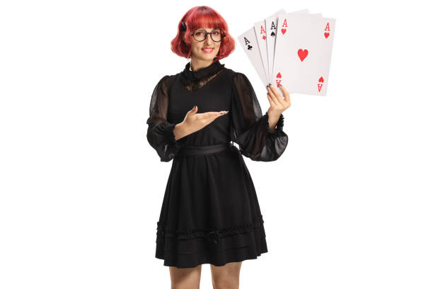 Female magician with cards showing four aces isolated on white background
