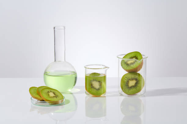 istock Glassware in the laboratory neatly arranged in a horizontal row on white background, advertising photos with frontal shot for products of beauty or health care has kiwi origin. Blank space for text 2153466945