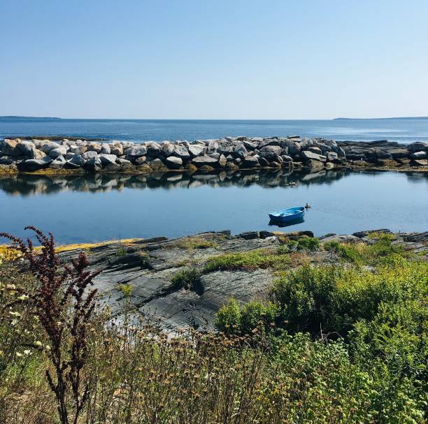 istock Oceanfront harbour with landscape and boat 2153478305