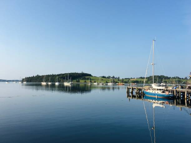 istock Oceanfront harbour with landscape and boat 2153478317