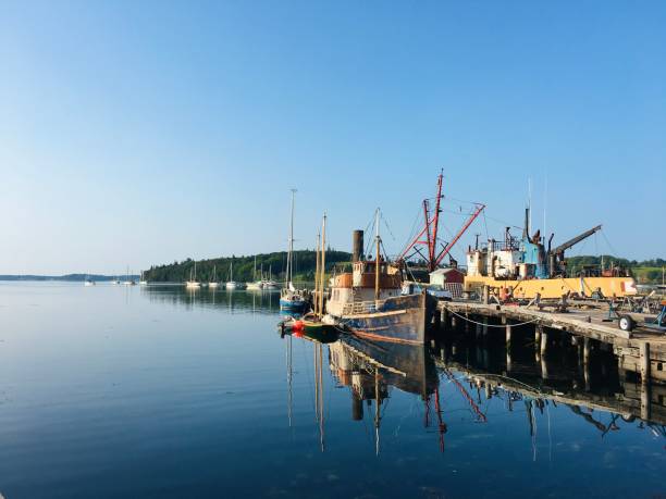 istock Oceanfront harbour with landscape and boat 2153478335