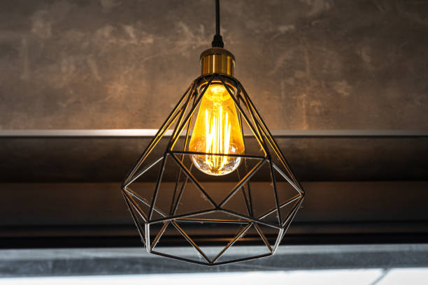 istock Ceiling lighting lamp with metal cage. 2153478924