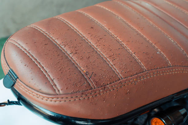 istock Vintage brown motorcycle joke damaged by cat scratches 2153479059