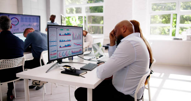 istock Distracted Employee In Office Team Meeting 2153480501