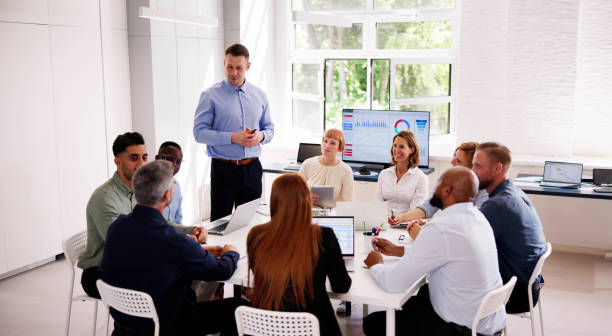 Company Inside Meeting In Office Boardroom Company Inside Meeting In Office Boardroom. Diverse Business Team education training class stock pictures, royalty-free photos & images