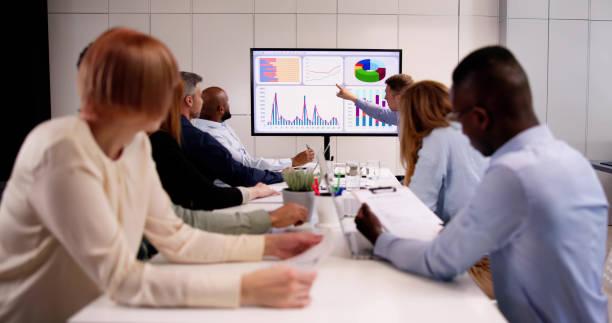 istock Professional Team In A Conference Room With TV Screen 2153480622