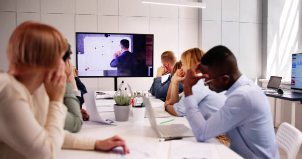 istock Bored Employee In Video Conference Training 2153480632