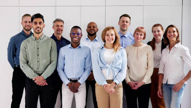istock Happy Group Of Business People Standing 2153481899
