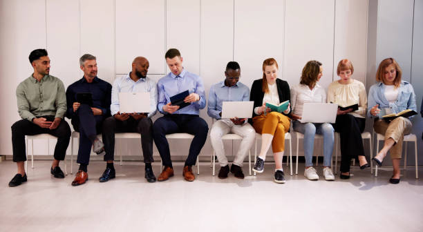 istock Row Of Diverse People Waiting For Job Interview 2153481909
