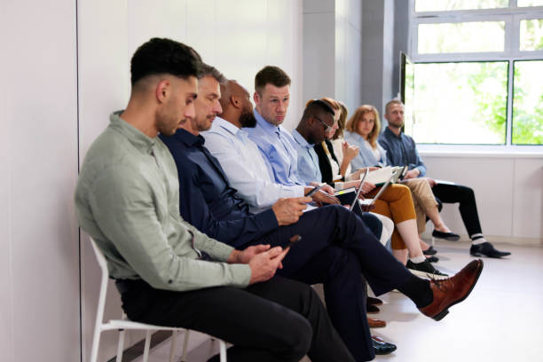 istock Row Of Diverse People Waiting For Job Interview 2153481927