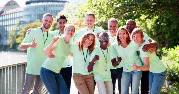 istock Happy Volunteer Group Celebrate 2153482033