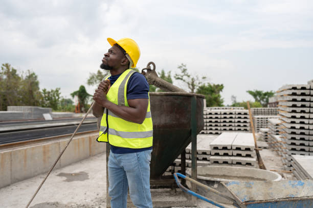 istock Tired Portrait African American worker man working with cement precast at precast cement outdoor factory 2153483243