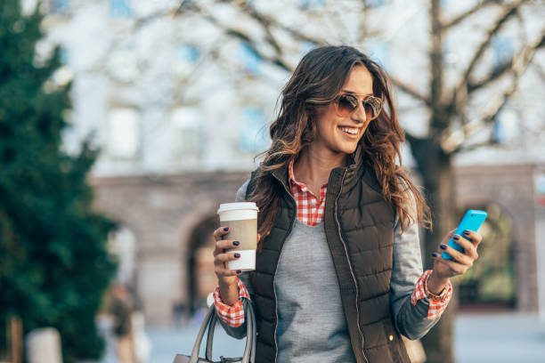 istock Texting in the city 2153488924