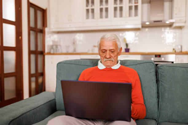 istock Senior man enjoys technology and serene retirement lifestyle 2153491531
