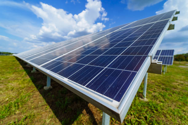 istock Close up view of solar panel on the field. Electricity generation with sunlight. 2153491900