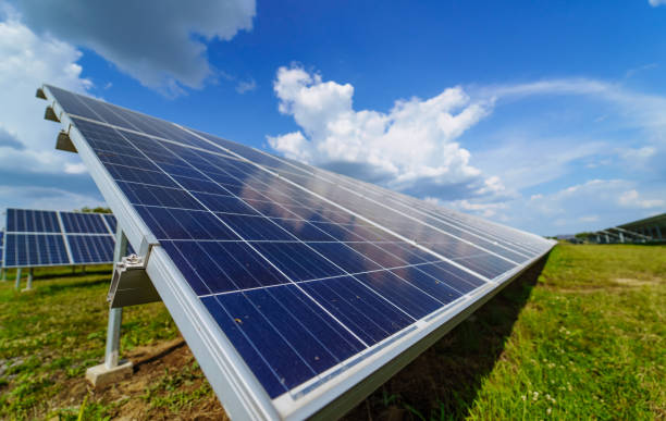 istock Electricity generation with sunlight. Close up view of solar panel on the field. 2153491923