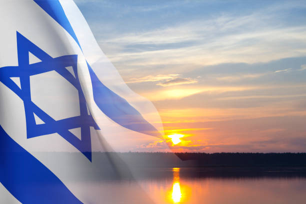 Israel flag with a star of David on sky background. Banner with place for text