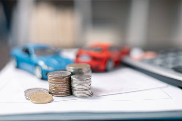 istock Business concept involved using finance calculator to determine premium for vehicle policy, ensuring clear financial contract for car. Investing in auto insurance can save money on transport costs. 2153494193