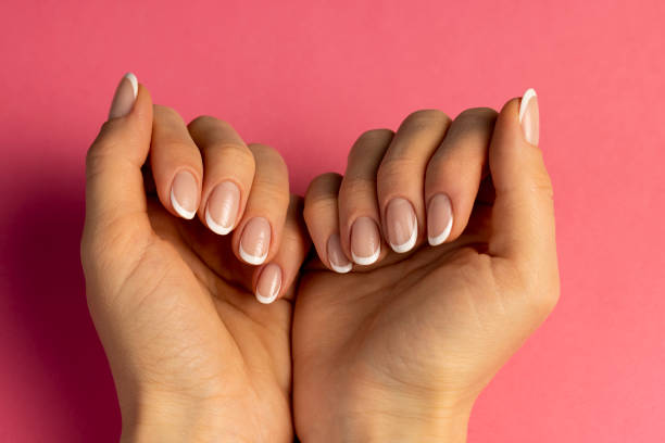 istock beautiful nails on a girl's hand 2153494801