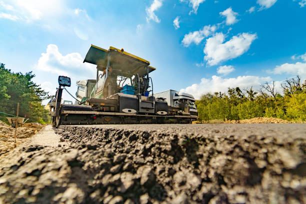 istock Road reconstruction with modern asphalt rollers. Highway transport repairing. 2153495196