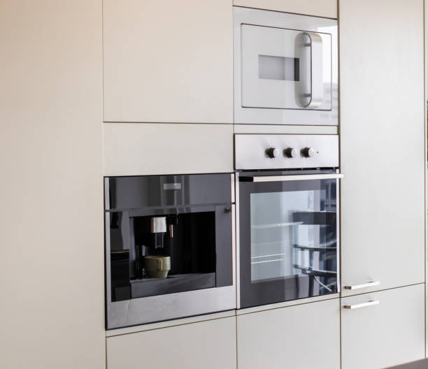 istock Microwave and oven built-in kitchen furniture 2153496007