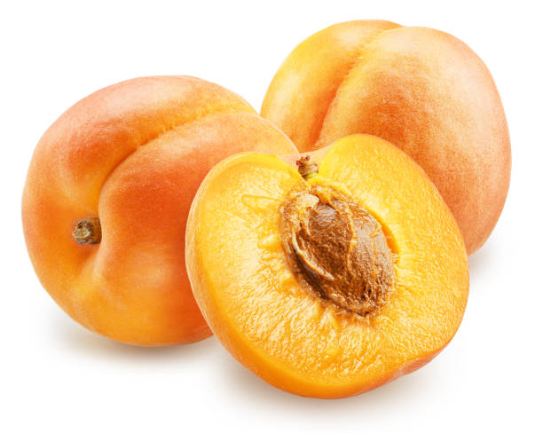 istock Ripe apricots and apricot half on white background. File contains clipping path. 2153497094