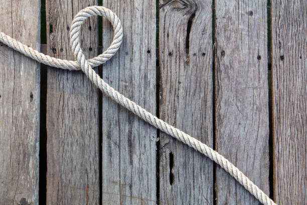 istock Rope on a wooden background 2153498334
