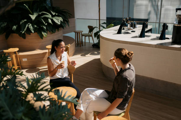 istock Two friends share moments and heartfelt conversations over coffee at cafe 2153503820