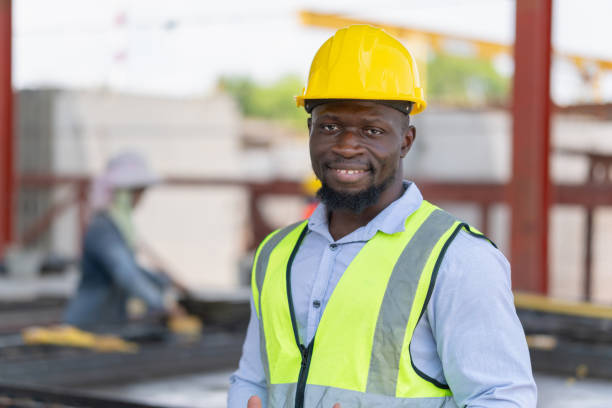 istock Cheerful engineer man take a break in the precast factory site, Foreman worker at the construction site 2153503977