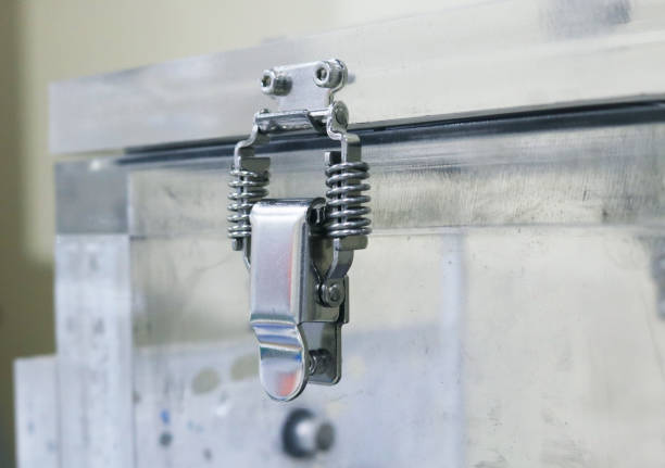 Close-up stainless steel catch clip.