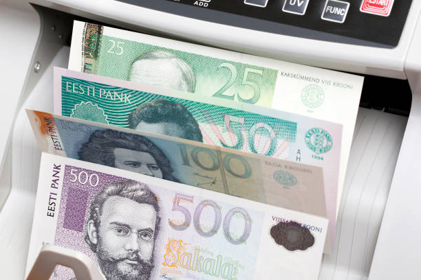 istock Estonian kroon in a counting machine 2153505082