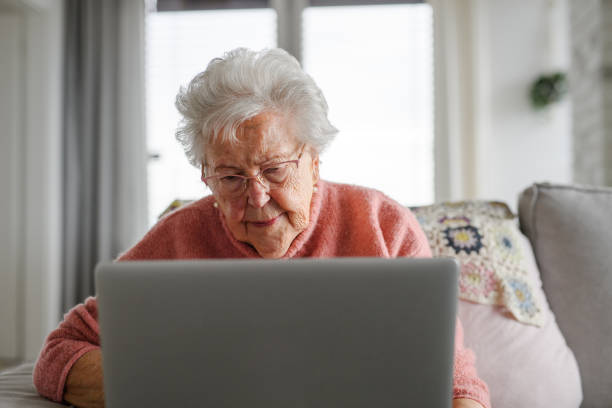 istock Senior woman learning to work with tablet, technology and internet. Importance of digital literacy for elderly people. 2153506757