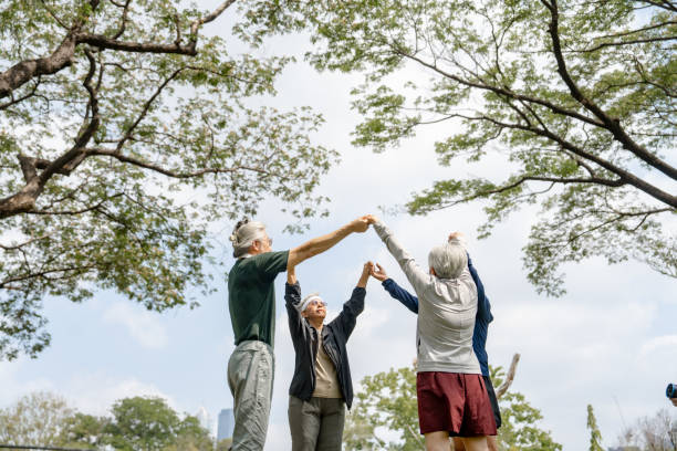 istock Seniors Holding Hands in Solidarity 2153508836