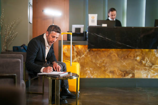 Part of a series: A businessman staying in hotel.