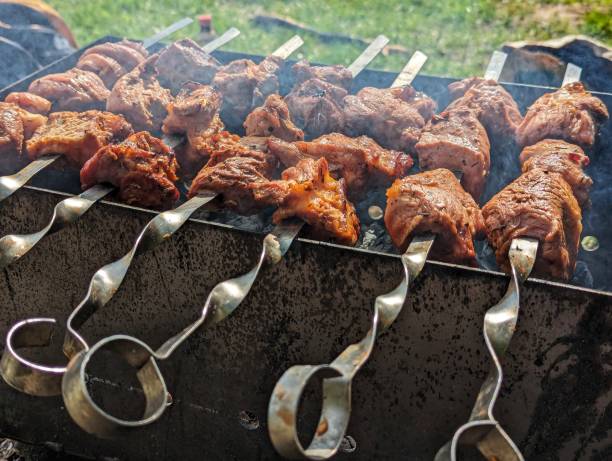 istock Cooking meat on the grill. 2153513656