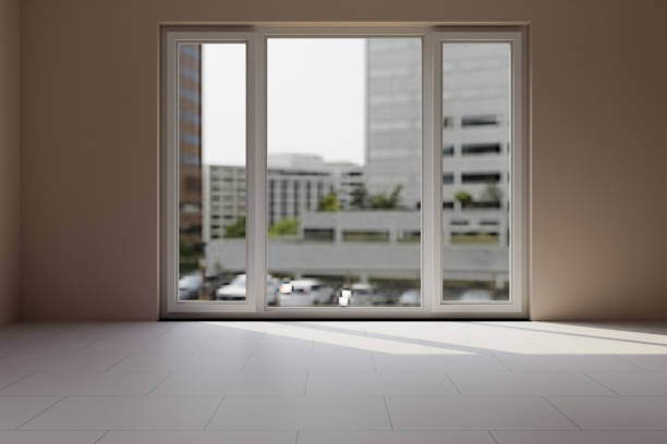 View of the panoramic window of a city apartment.