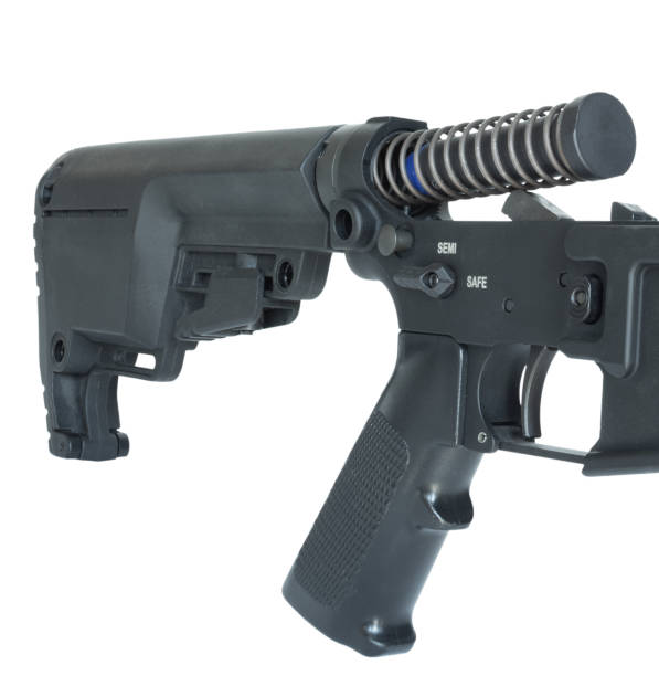istock Field stripped AR-15 with buffer spring and weight coming out 2153523356