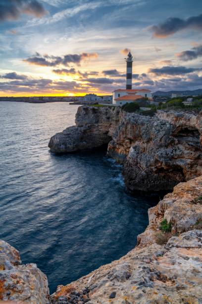 istock view of the Portocolom Lighthouse in eastern Mallorca at sunset 2153528731