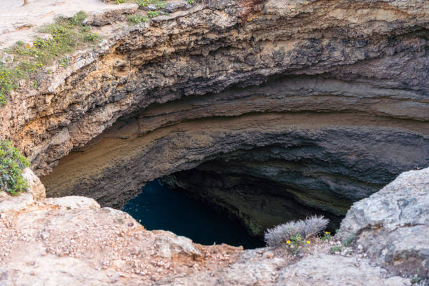 Benagil caves in algarve portugal. Gruta de Benagil. Top of view. Benagil caves in algarve portugal. Gruta de Benagil. Top of view beautiful beach in carvoeiro algarve portugal stock pictures, royalty-free photos & images