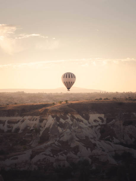 Hot air ballooning over Cappadocia is one of the most iconic tourist attractions in the region. At dawn, as the sun rises over the extraordinary landscape of rock formations, valleys, and ancient caves, balloons take to the sky, offering breathtaking views. This magical experience allows visitors to admire Cappadocia's unique geology from a bird's-eye perspective, creating unforgettable memories.