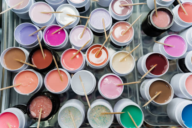 istock Various paints in hues like pink, violet, and magenta 2153543728
