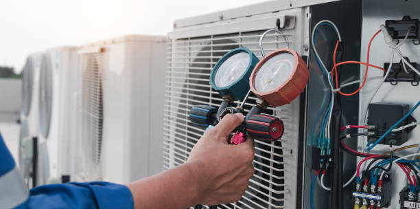 istock Technician is checking air conditioner,measuring equipment for filling air conditioners. 2153545191